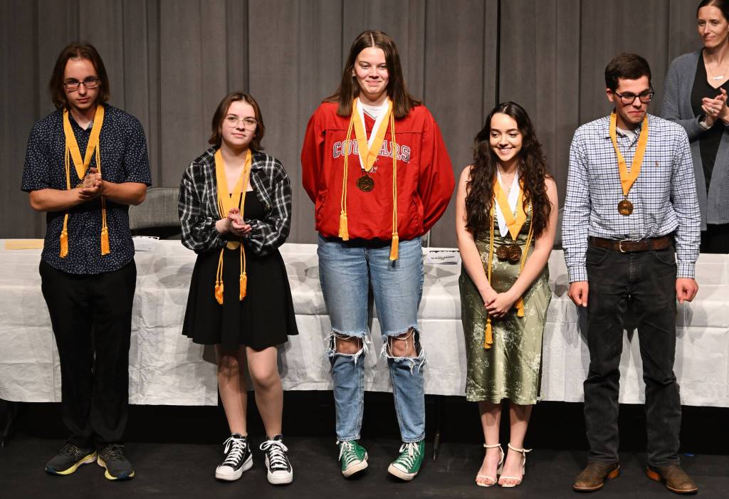 Photo by Jay Cline / From left, Brody Andersen, Erin Cline, Dani Herman, Kimberly Flores and Sage Younger are honored for their academic efforts and at Sequim High Schools Scholarship Night on June 5.