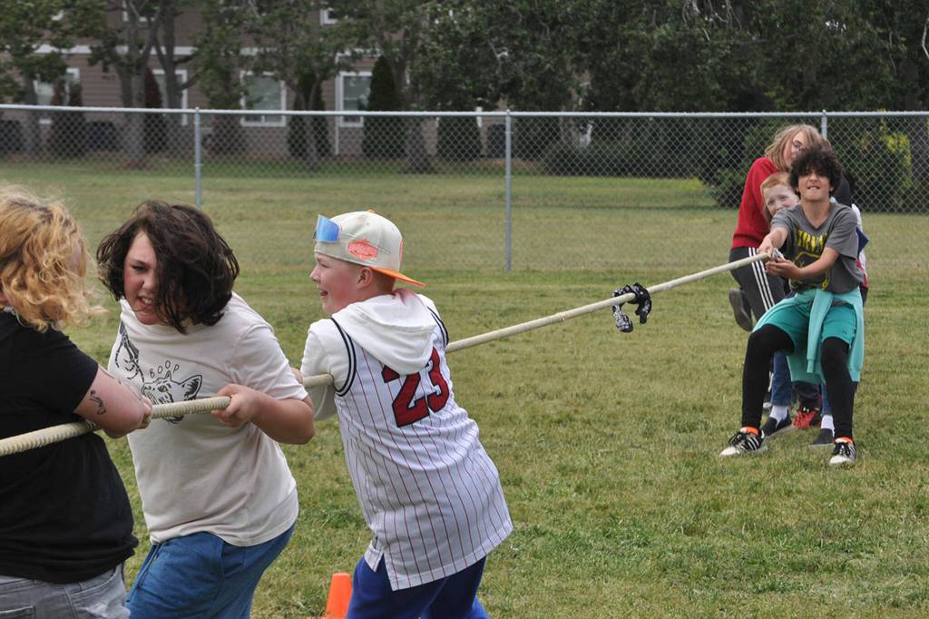 Sequim Gazette photo by Matthew Nash/ Fourth and fifth graders from Helen Haller participate in a game of tug-of-war on June 11.