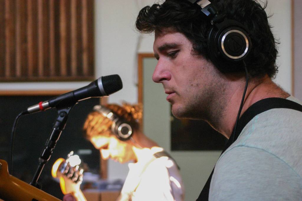 Photo taken by Bergen De Koch / Songwriter Stephen Fuller (front) and bassist Colin Schmidt recording for Caro Kanns self-titled debut in Port Townsends Rainshadow Recording Studio in September 2022.