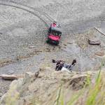 Photo courtesy of John McKenzie/ Firefighters rappelled down bluffs north of Sequim overlooking the Strait of Juan de Fuca to help a woman who was hurt while looking for her dog that fell.