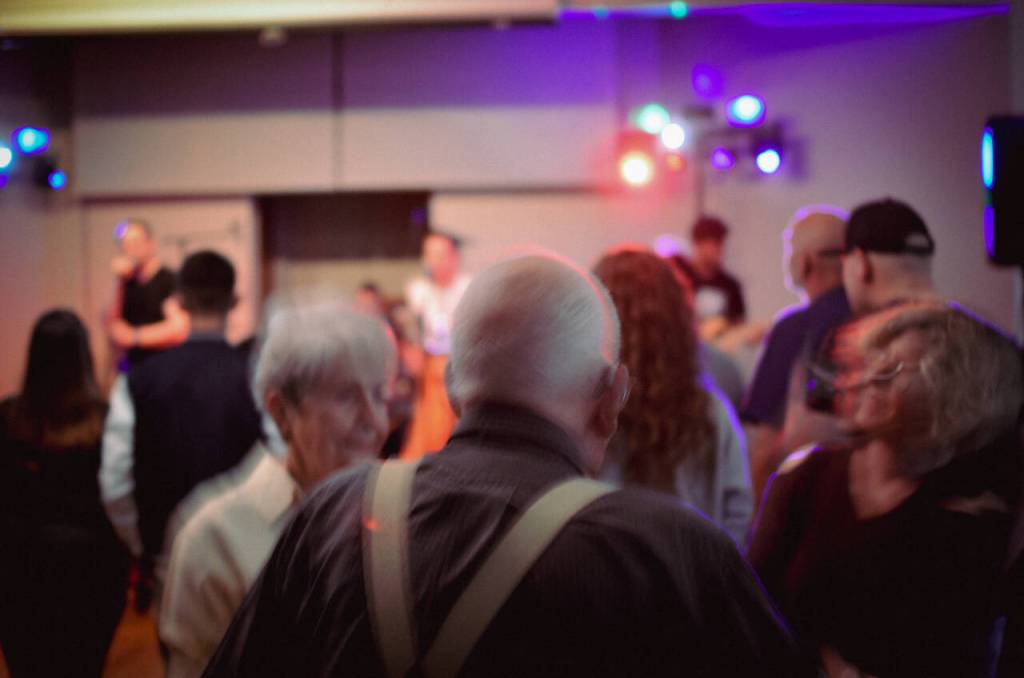Sequim Gazette photo by Elijah Sussman / SuperNostalgic draws a full crowd on the Sequim Elks dance floor in early May.