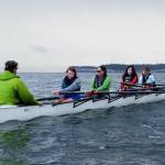 Photo by Michael Lampi/Sound Rowers / From left, coxswain Sean Halberg and rowers Quinn Peterson, Amanda Chan, Abby Cassel and Haverly Peterson of Olympic Peninsula Rowing Association compete in the Rat Island Regatta in Port Townsend on June 15.
