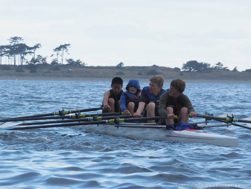 Photo by Michael Lampi/Sound Rowers / From left, Mason Mai, Quince Chanway, Noah Oberly and Teig Carlson of the Olympic Peninsula Rowing Association compete in the Rat Island Regatta in Port Townsend on June 15.