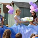 Sequim Gazette file photo by Matthew Nash In 2017, Sequim Irrigation Festival Royalty Princess Alison Cobb reads to a crowd at the Sequim Library while Queen Karla Najera, left, and Princess Emily Straling listen in. The library system hosts a princess storytime event on July 23 at its temporary location at 609 W. Washington St., from 9:30-10 a.m.