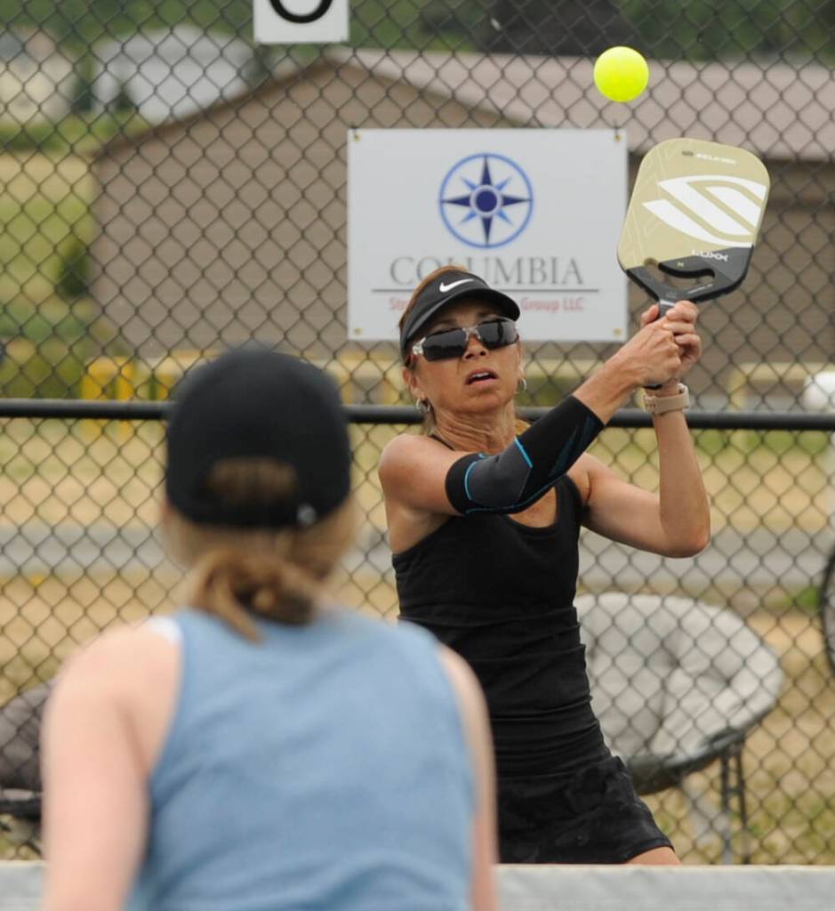 Sequim Gazette photo by Michael Dashiell / Kathy Hunter returns a shot in the Sequim Fling Pickleball Tournament on June 29.