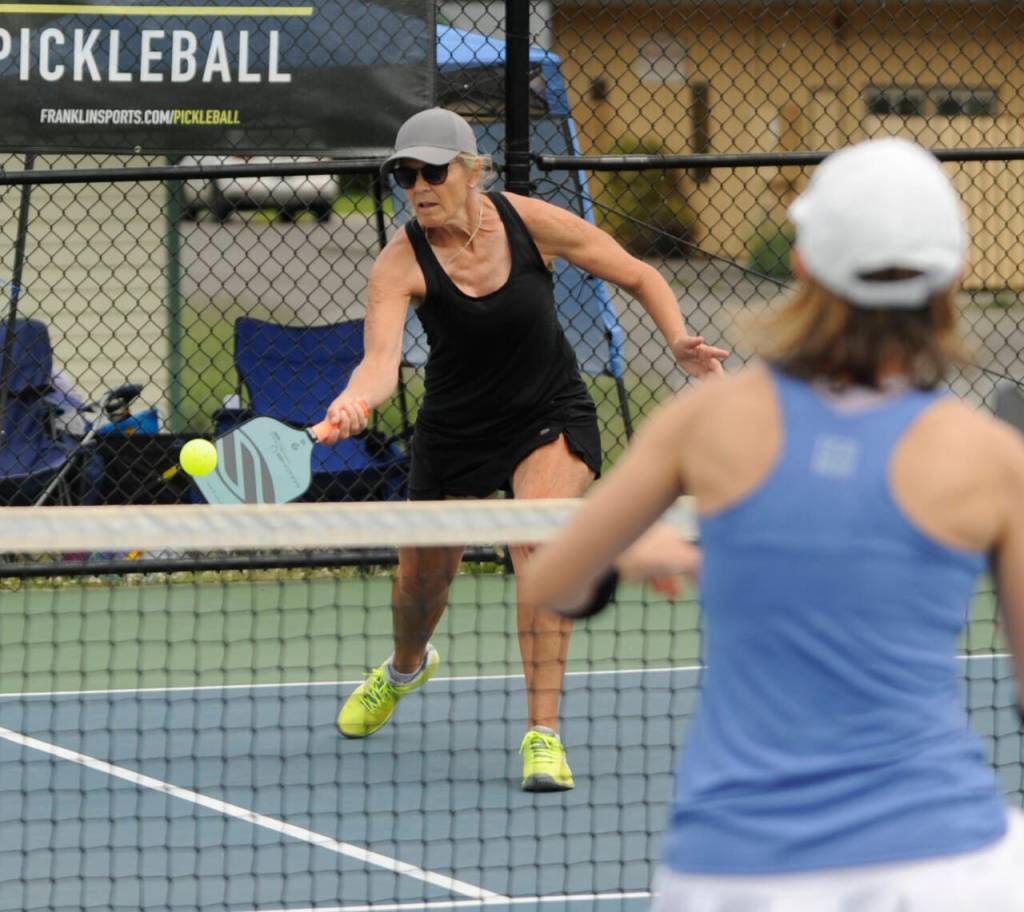 Sequim Gazette photo by Michael Dashiell / Stacy Nelson returns a shot in the Sequim Fling Pickleball Tournament on June 29.