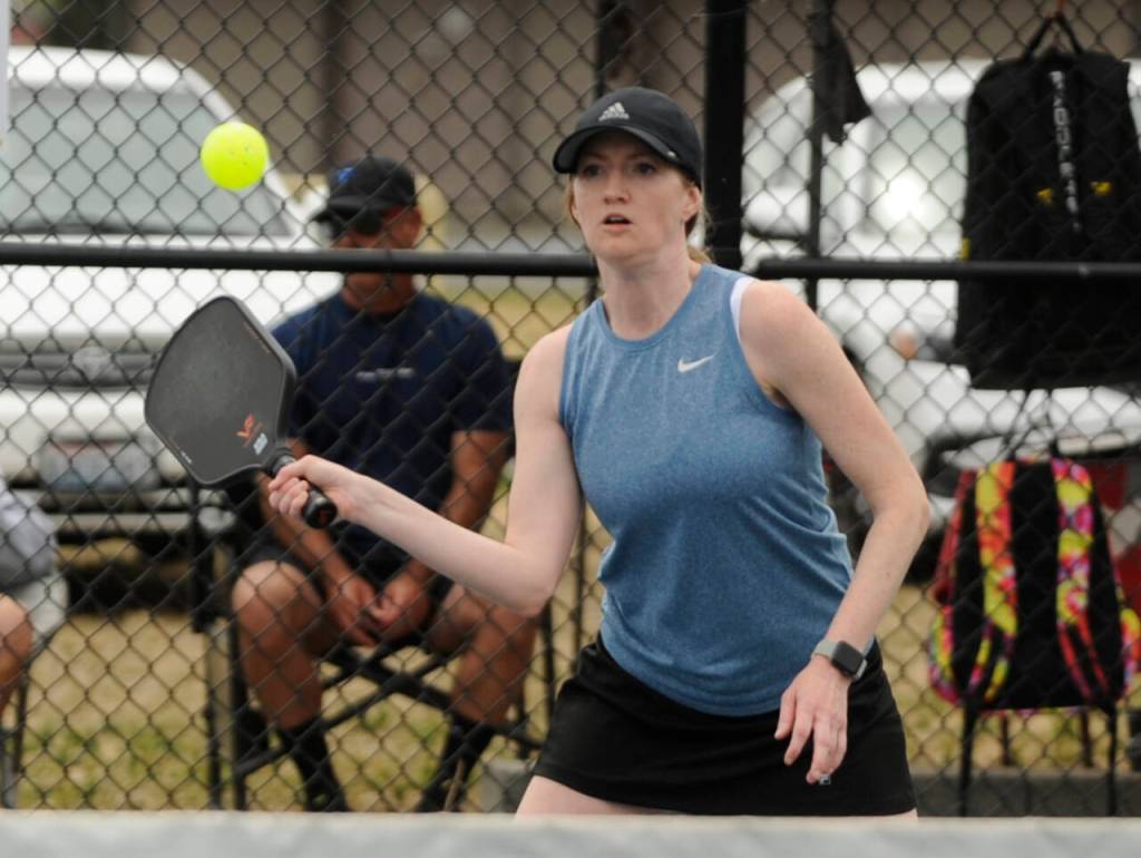 Sequim Gazette photo by Michael Dashiell / Becky Carlson returns a shot in the Sequim Fling Pickleball Tournament on June 29.