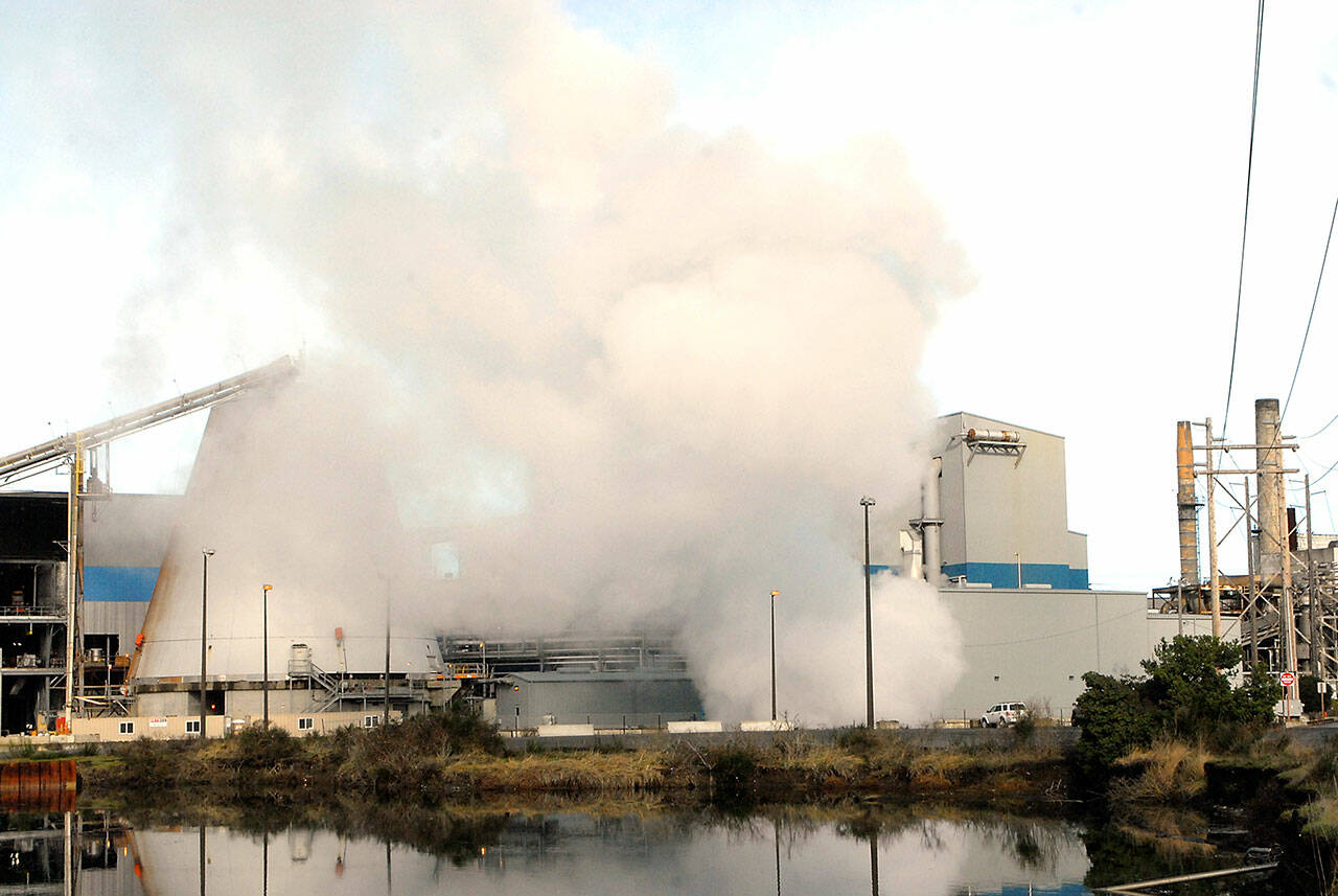 File photo by Keith Thorpe/Olympic Peninsula News Group
Clouds of steam rise from the cogeneration facility at the McKinley Paper mill on Marine Drive in Port Angeles in January 2020 as crews began the process of bringing the mill back into production, three years after it was shut down by and sold by Nippon Paper Industries USA. McKinley Paper Company representatives said last week they are laying off 193 employees at its Port Angeles location on Aug. 25.