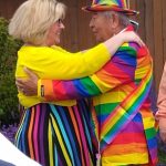 Photo courtesy Sarah McCullem/ Singer Amanda Bacon and grand marshal Michael Lowe hug at the Sequim Pride event on June 29,