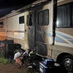 Photo courtesy of Clallam County Fire District 3 / An early-morning fire on July 3 sent a Sequim man to the hospital with second degree burns. Firefighters say the likely cause was discarded cigarette ash that burned a pile of cardboard and trash just outside a recreational vehicle.