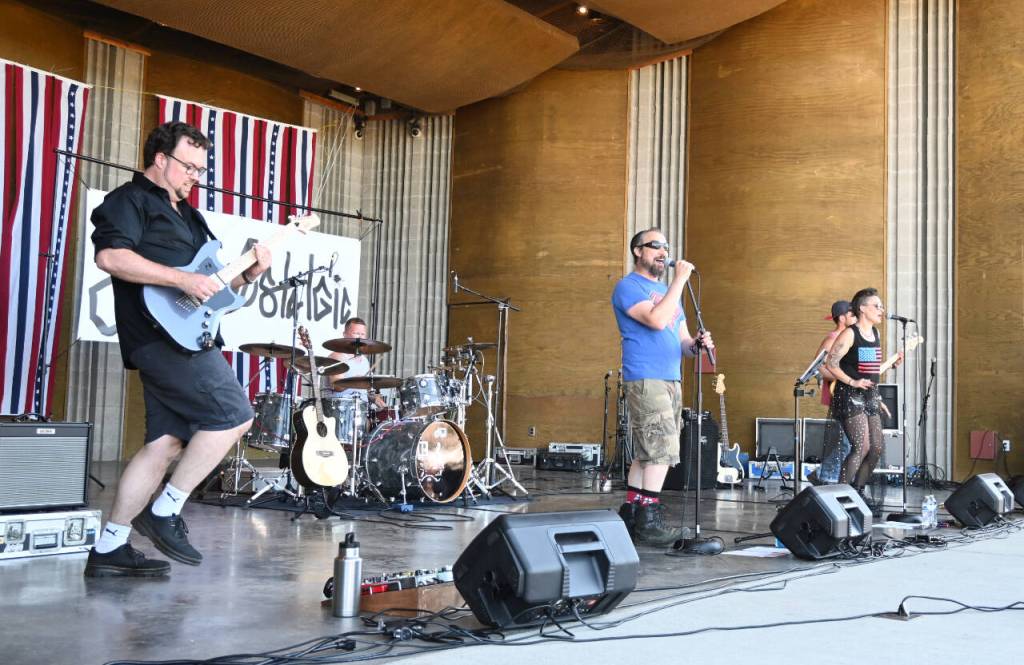 Sequim Gazette photo by Michael Dashiell / SuperNostalgic rocks out at the City of Sequims Independence Day celebration at Carrie Blake Community Park on July 4. Pictured, from left, are guitarist Brandon Bettger, drummer Mike Echternkamp, singers Jeremy Pederson and Sadie Sprenger, and bassist Adam Bettger.