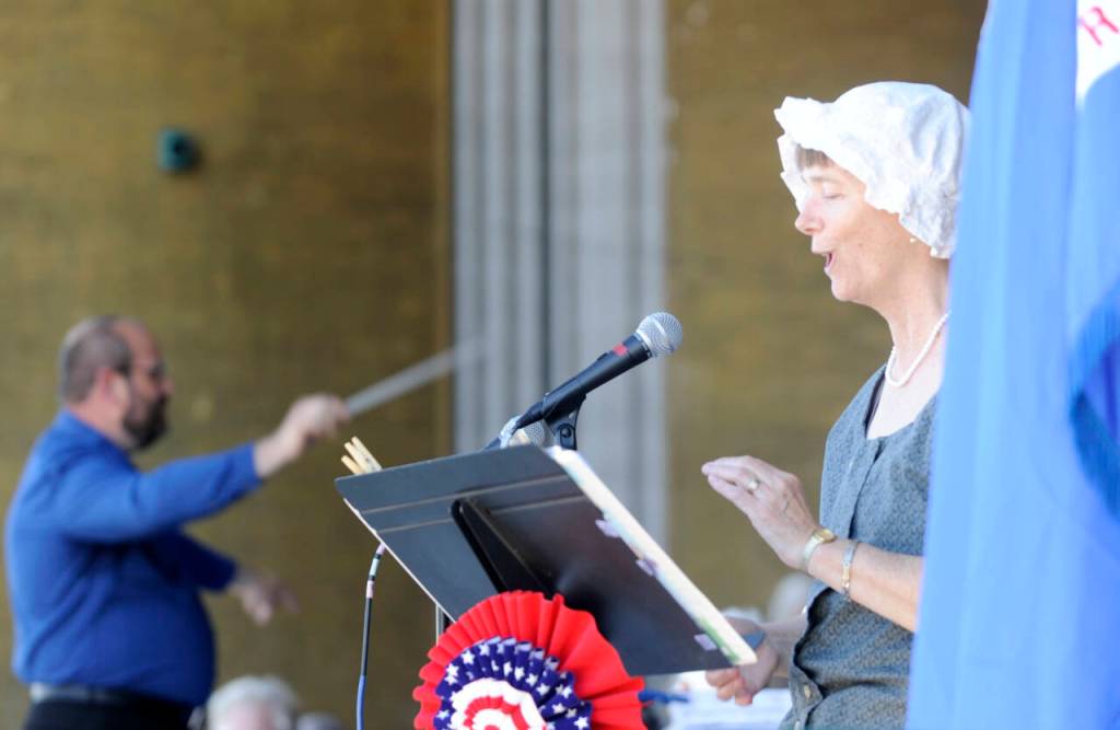 Sequim Gazette photo by Michael Dashiell
Sequims Karla Morgan helps lead the Sequim City Bands A Patriotic Fourth program during the Independence Day celebration on July 4 at Carrie Blake Community Park.