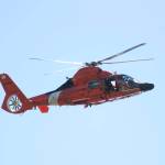Sequim Gazette photo by Michael Dashiell
A crew from the U.S. Coast Guard Station Port Angeles soars over Carrie Blake Community Park during the Sequim City Bands rendition of the Armed Forces Salute during the City of Sequims Independence Day Celebration on July 4.
