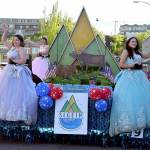 Photo by Keith Thorpe/Olympic Peninsula News Group
Sequim Irrigation Festival royalty, from left, Princess Ashlynn Northaven, Princess Kailah Blake and Queen Ariya Goettling ride on their festival float on Independence Day in Port Angeles.