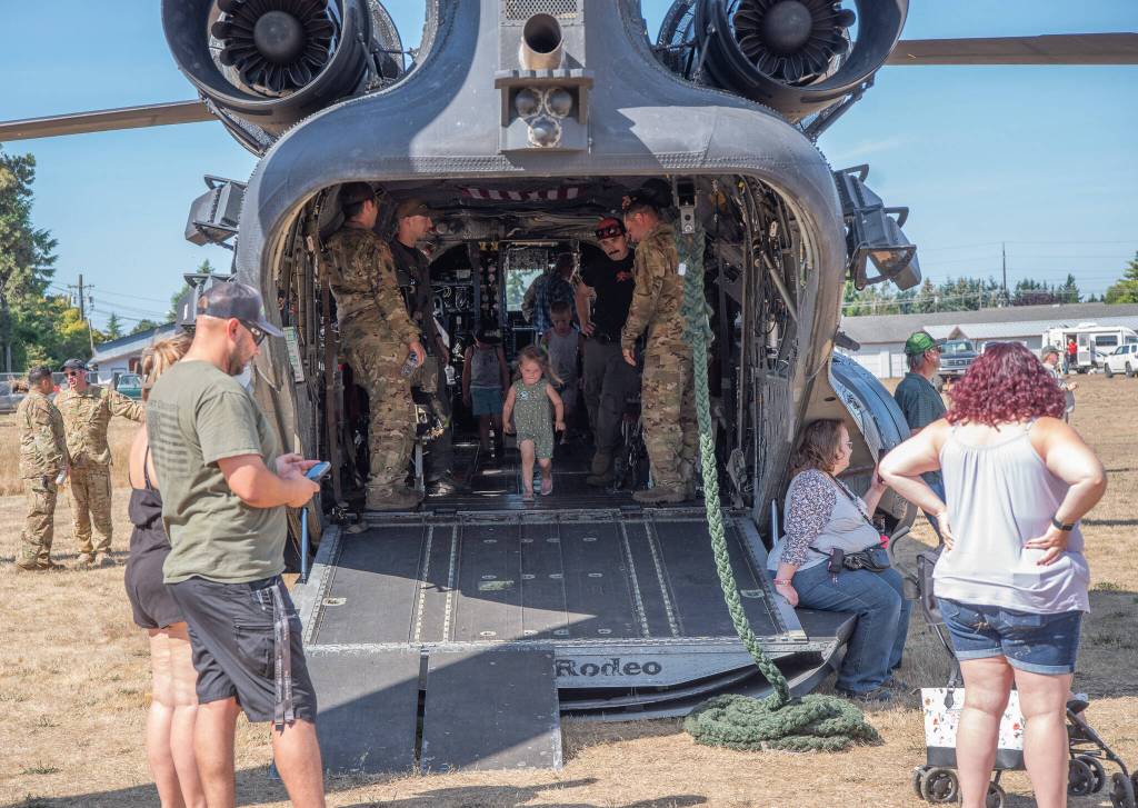 Sequim Gazette file photo by Emily Matthiessen / A United States Army Night Stalkers helicopter, a War Bird 3789, part of the Evil Empire company, is open for public viewing at the Unity of Effort event in 2023. The annual event is billed as a chance for the community to thank first responders and military professionals that keep communities and the nation safe and hosted by Security Services Northwest Inc. and Fort Discovery, Inc.