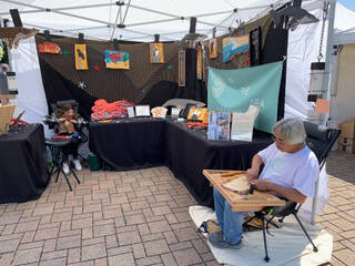 Photo courtesy of Larry Gonzalez / Larry Gonzales creating relief carving from wood local to the Pacific Northwest.