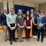 Photo courtesy of Olympic Medical Center
Olympic Medical Center leaders pay honor to speech language pathologist team members at a recent meeting. Pictured, from left, are: Rehabilitation Services director Ken Burkes; speech language pathologists Bailey Levis, Bernadette Teel, and Jacqueline Levet, OMC chief medical officer Scott Kennedy, and speech language pathologists Sherne-Marie McMillian and Jennifer Weicher.