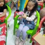 Photo courtesy of Operation Christmas Child / A young girl in Quito, Ecuador, opens her Operation Christmas Child shoebox.