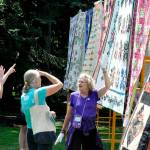 Sequim Gazette photo by Matthew Nash
Bernadette Shein helps answer quilt questions for visitors of the Sunbonnet Sue Quilt Clubs annual quilt show in 2023. This year, the event moves to Trinity United Methodist Church and expands to two days, July 19-20.