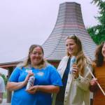 Sequim Gazette photo by Elijah Sussman / From left, Ruby Coulson, Eden Voebel, Jordan Higgins, and Montana Napier stand in front of Cedar Hat House at Dungeness River Nature Center on June 26.