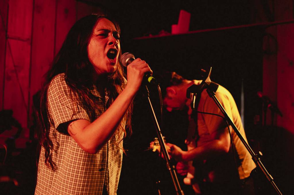 Sequim Gazette photo by Elijah Sussman / Helen and Richard Rico Vinh of the band Pistil play onstage at Tarboo Fest on July 4.