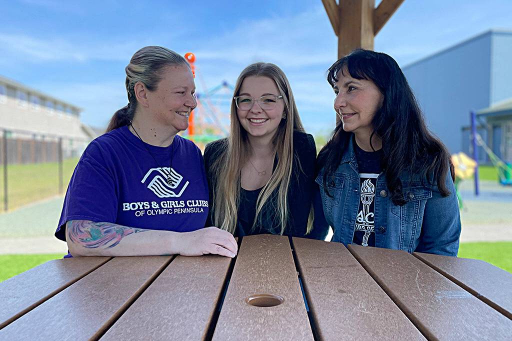 Sequim Gazette photo by Matthew Nash/ Boys & Girls Clubs National Youth Talent performer Pearle Peterson sits with two of her biggest advocates last year, Tessa Jackson, Sequim unit director, and Mary Budke, CEO of the Boys & Girls Clubs of the Olympic Peninsula. Peterson went on to sing across the country including at the 2023 World Series.
