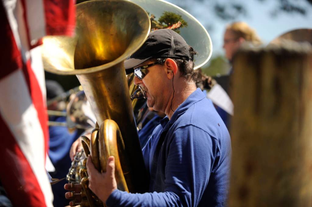 Sequim Gazette photo by Michael Dashiell / Sequim City Band member Jason Wilwert plays at the unveiling of the Remember Me mural in Sequim on July 20.