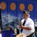 Sequim Gazette photo by Michael Dashiell / American Legion post Commander Carl Bradshaw speaks at the unveiling of the Remember Me mural in Sequim on July 20.