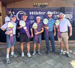 The winners of the 13th annual Sonny Sixkiller Huskies Celebrity Classic at Cedars at Dungeness. From left, Ed Cribby, Mark Mitrovich, Bob Mathews, Hunter Larson and Nick Larson played on the D.A. Davidson team. (Courtesy photo)