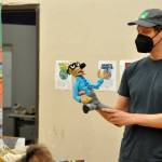 Sequim Gazette photo by Matthew Nash/ Cartoonist Aron Nels Steinke hold a puppet he made of his Mr. Wolf character thats modeled after him and his time as a teacher.