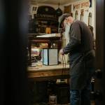 Photo courtesy Alyssa Teuton/ Justin Pollak uses his experience in woodworking to help customers restore family heirlooms and furniture at the Carlsborg Store.