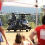 Sequim Gazette photo by Michael Dashiell / Attendees of the Unity of Effort event in Sequim on Aug. 10 get a look at an MH-47G Chinook, a U.S. Army twin-engined, tandem rotor helicopter.