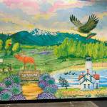A new mural by artist Amelia Kaiser called Spirit of Sequim is now inside by the main entrance of the Sequim Walmart.