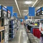 Sequim Gazette photo by Matthew Nash/ During the Sequim Walmarts remodel, crews added new aisle signage with more descriptions, and large signs above each section.