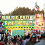 Sequim Gazette file photo by Michael Dashiell / Crowds pack the carnival at the Clallam County Fair in 2023.