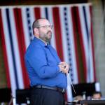 Sequim Gazette file photo by Michael Dashiell / Tyler Benedict, Sequim City Bands band and music director, leads the group in patriotic tunes at their annual Independence Day concert in July.