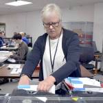 Photo by Keith Thorpe/Olympic Peninsula News Group / Clallam County election worker Janet Parris of Port Angeles sorts through incoming primary ballots at the Clallam County Courthouse on Aug. 6.