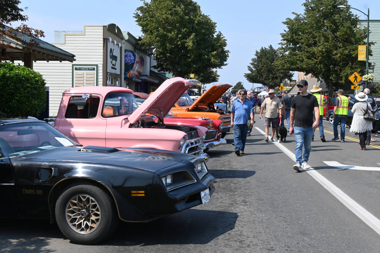 Sequim Gazette photo by Michael Dashiell / The seventh-annual Sequim Prairie Nights car show and shine draws hundreds of visitors to downtown Sequim on Aug. 10. The event, featuring some of the top classic cars, trucks and motorcycles in the region, raises funds for scholarship to students typically going into the fields of automotive technology/collision repair, welding, or other construction trades.