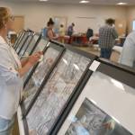 Sequim Gazette photo by Michael Dashiell / Visitors enjoy the 2024 Strait Stamp Show at the Guy Cole Event Center on Aug. 10.