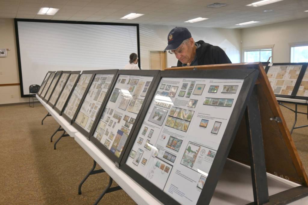Sequim Gazette photo by Michael Dashiell / Visitors enjoy the 2024 Strait Stamp Show at the Guy Cole Event Center on Aug. 10.