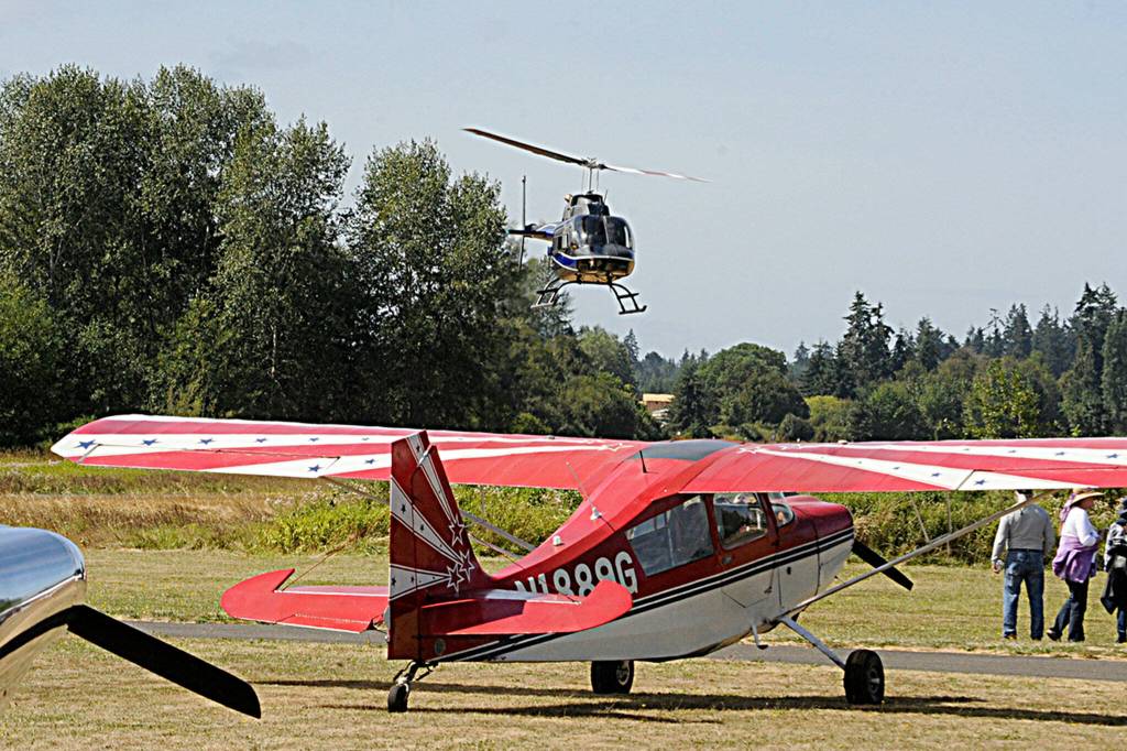Sequim Gazette photo by Matthew Nash/ Helicopter, plane, and tethered hot air balloons will be available for a fee or donation at the Olympic Peninsula Air Affaire and Sequim Valley Fly-In on Aug. 24. Seen here is one of Seattle Air Taxis helicopters.
