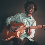 Photo courtesy of Ko Tonga Cheol 
Congolese guitarist and singer Niwel Tsumbu leads a performance of Ko Tonga Cheol on Oct. 6 at Field Arts and Events Hall.