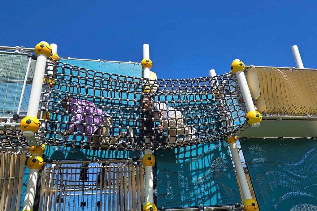 Children enjoy playing on the Wagga Wagga playground set by Berliner in Lahaina, HI. Its the first of its kind installed in the world, and it was donated by Berliner playground partners like Danielle Patterson of Sequim. She helped coordinate the donation after August 2023 wildfires displaced students at King Kamehameha III Elementary School and their new temporary school did not have a playground.