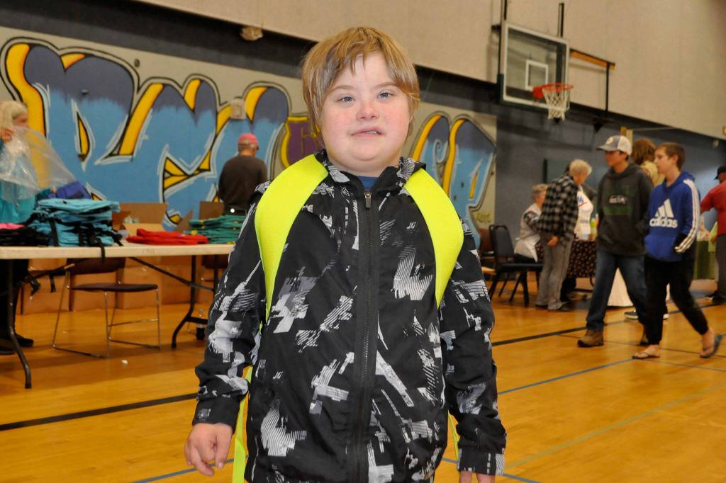 Nine-year-old Michael OHara is all smiles after getting a new backpack at the Back to School Fair on Aug. 24.