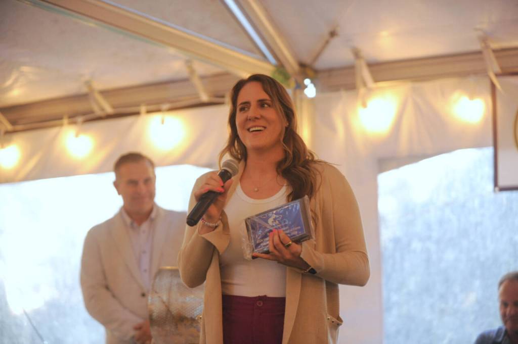 Sequim Gazette photo by Michael Dashiell / Summer Jackson accepts her 2024 Sequim Athletic Hall of Fame honor at The Cedars at Dungeness on Sept. 14.