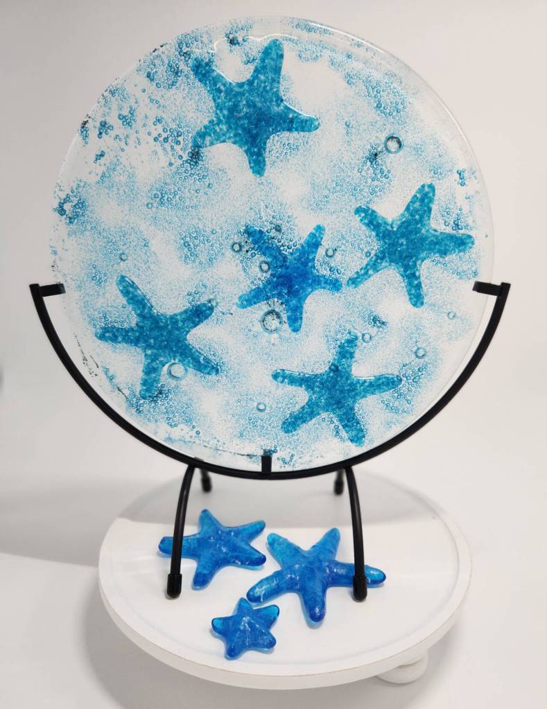 Photo courtesy of Lynda Tartaglino / La Petite Maison Blanche, 213 E. Washington St., features artwork by Lynda Tartaglino of JPaws Art.