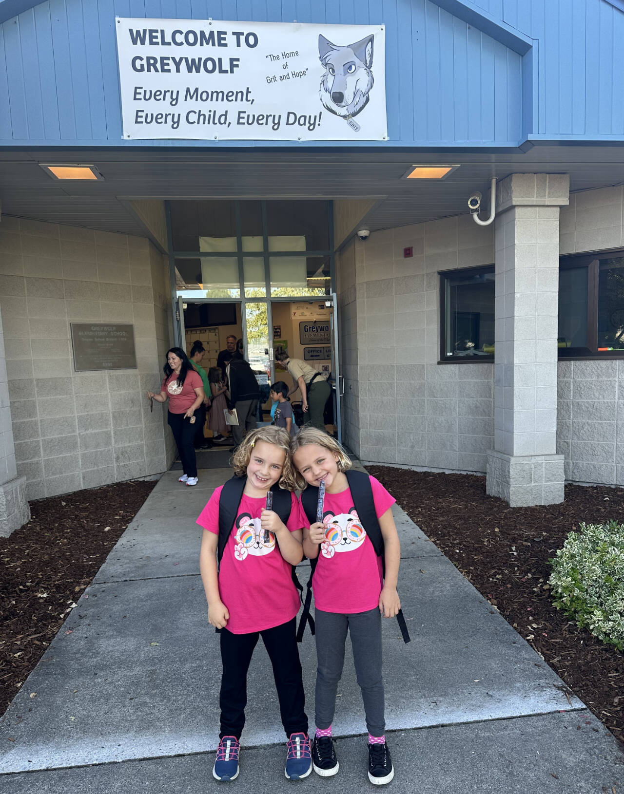 Photo courtesy of Puhrmann family / Twins Mariah and Madilyn Puhrmann share a smile before their first day of first grade at Greywolf Elementary School.