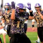Sequim Gazette photo by Michael Dashiell / Sequim High running back Liam Wiker celebrates the first of two touchdowns in the Wolves season-opening 35-26 win over Forks on Sept. 6.