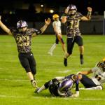 Sequim Gazette photo by Michael Dashiell / Sequim players celebrate Malachi Hamptons interception in the second half of the Wolves win over Forks on Sept. 6.