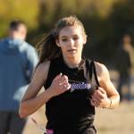 Sequim Gazette photo by Michael Dashiell / Sequims Dawn Hulstedt races to a third place finish at an Olympic League cross country meet in Sequim in 2023.